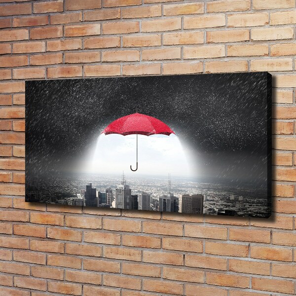 Canvas wall art Umbrella above the city