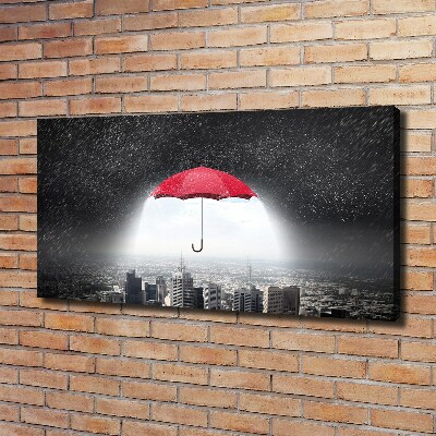 Canvas wall art Umbrella above the city