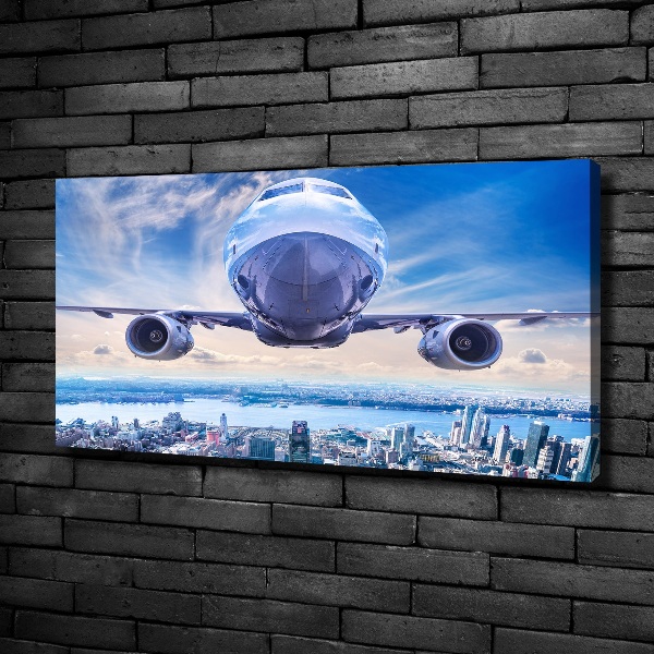 Canvas wall art Aircraft over the city