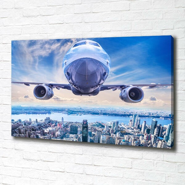 Canvas wall art Aircraft over the city