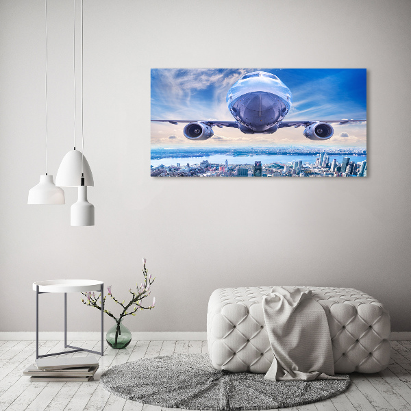 Canvas wall art Aircraft over the city