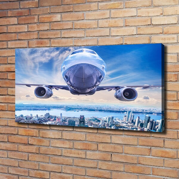 Canvas wall art Aircraft over the city