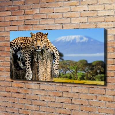 Canvas wall art Leopard on the trunk