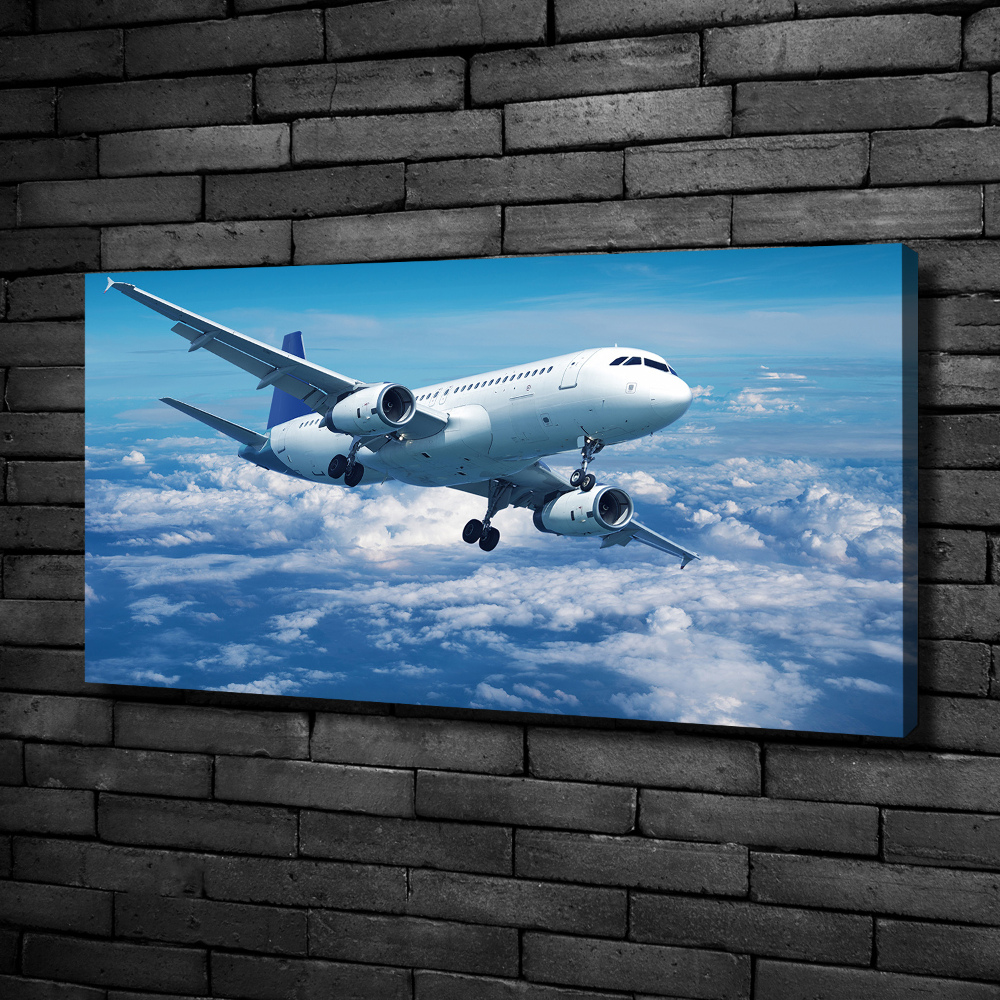 Canvas wall art Aircraft in the clouds