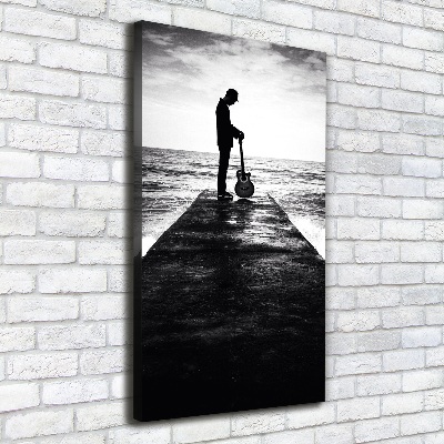 Canvas wall art Guitarist on the pier