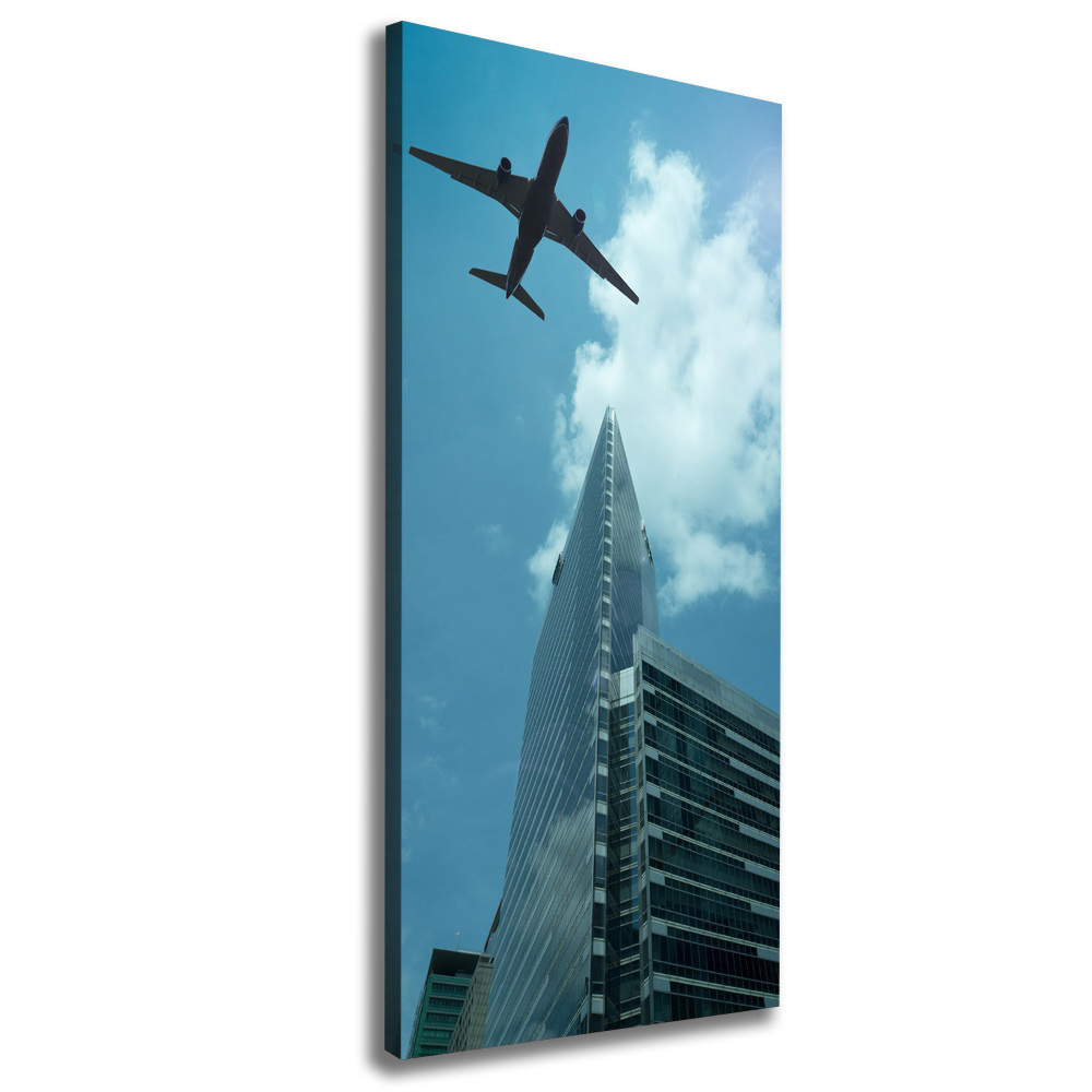 Large canvas wall art Aircraft over the city