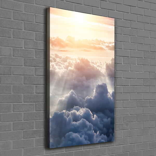 Picture canvas print Flight over the clouds