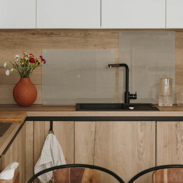 Glass worktop protector with a double semi‑transparent finish