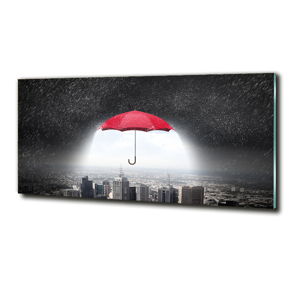 Glass art print Umbrella above the city