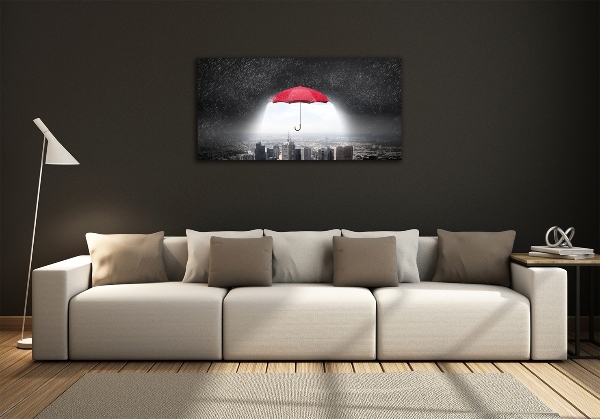 Glass art print Umbrella above the city