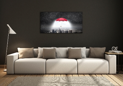 Glass art print Umbrella above the city