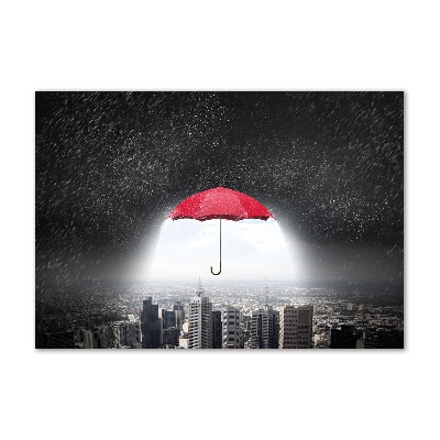 Glass art print Umbrella above the city