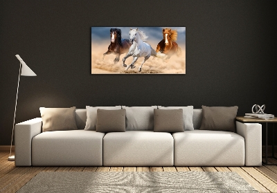 Glass wall art Horses in the desert