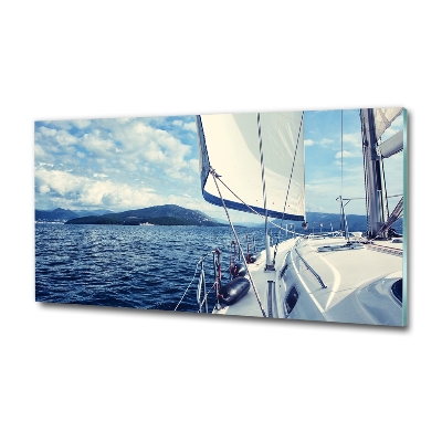 Glass wall art Yacht against the background of the sea