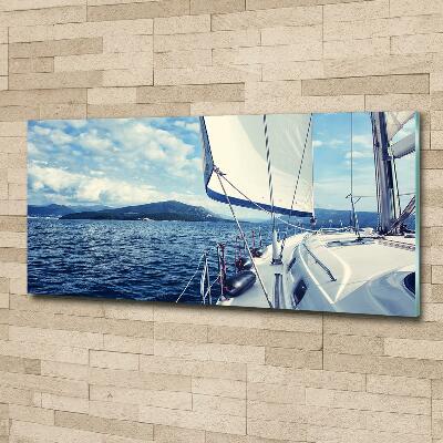 Glass wall art Yacht against the background of the sea