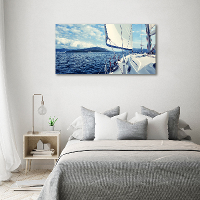 Glass wall art Yacht against the background of the sea