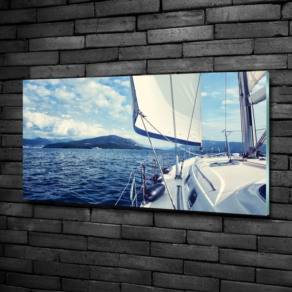 Glass wall art Yacht against the background of the sea