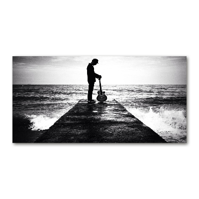 Photo printed on glass Guitarist on the pier