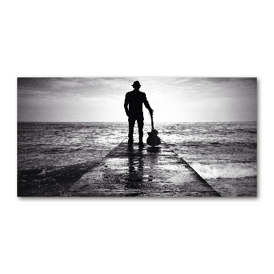 Photo printed on glass Guitarist on the pier