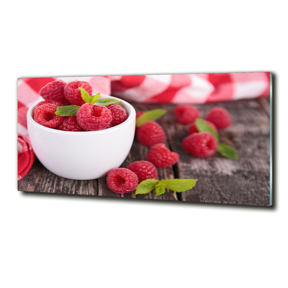 Glass picture print Raspberries in a bowl