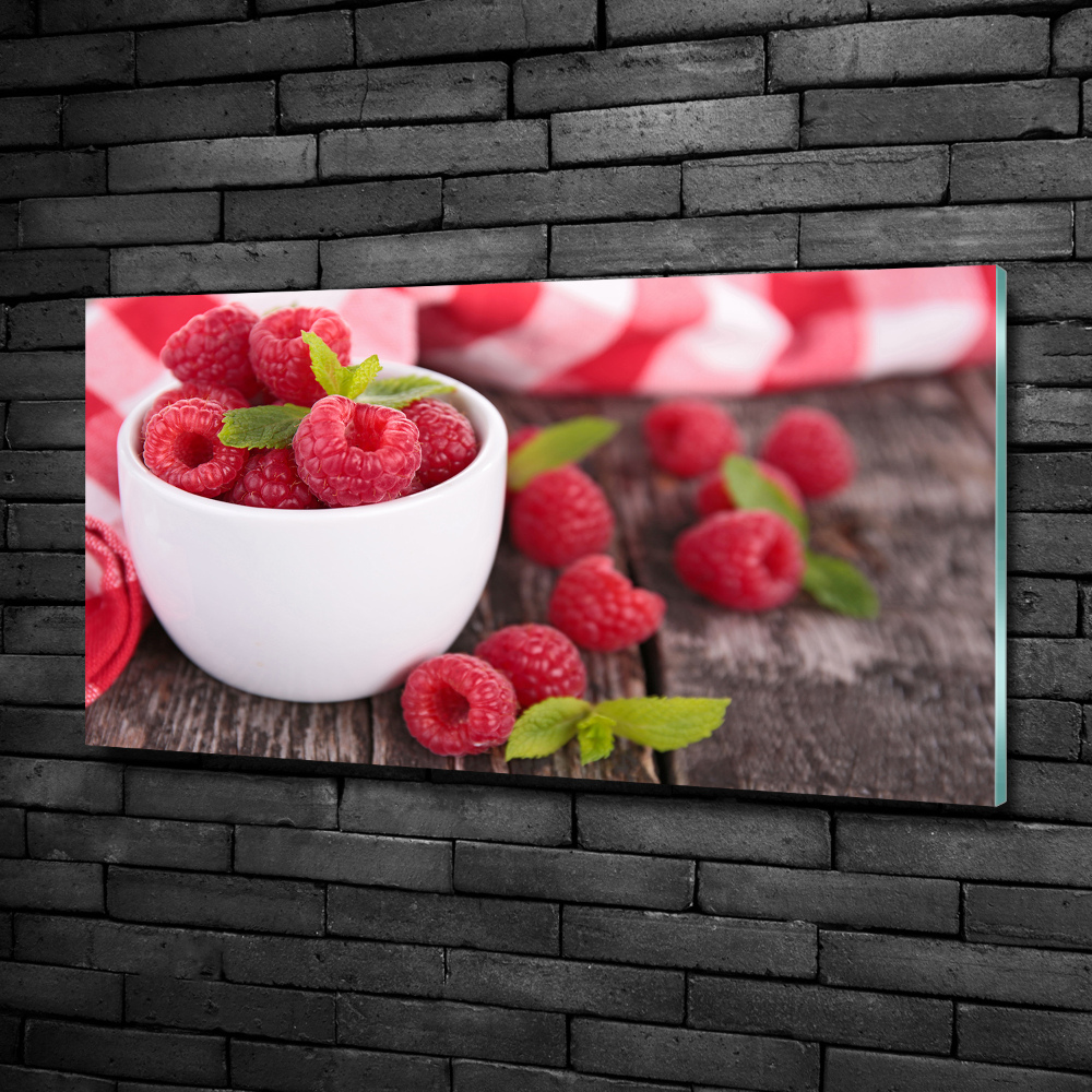 Glass picture print Raspberries in a bowl