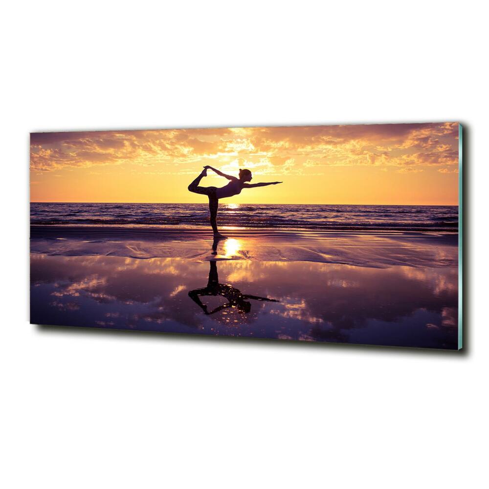 Photo printed on glass Yoga on the beach