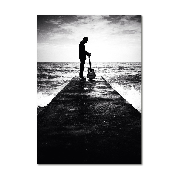 Wall art on glass Guitarist on the pier