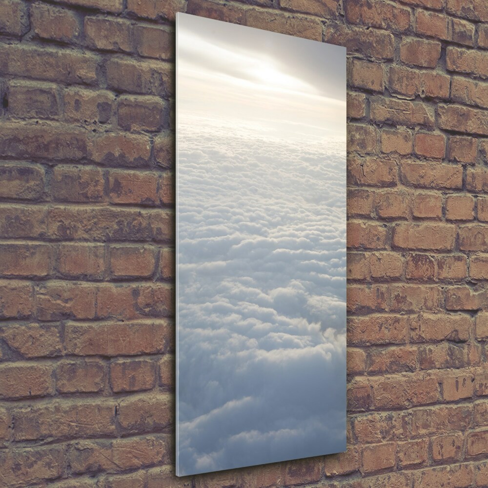 Glass wall art Flight over the clouds