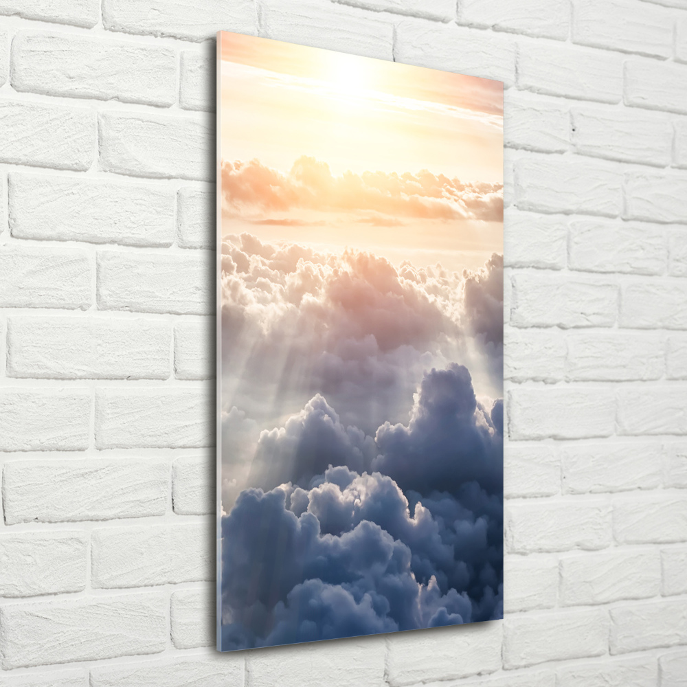 Glass wall art Flight over the clouds