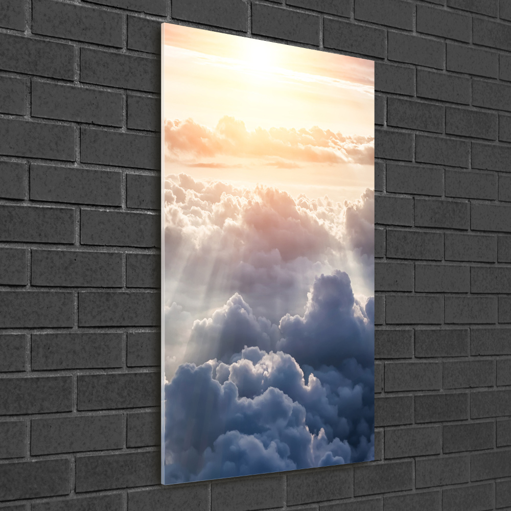 Glass wall art Flight over the clouds