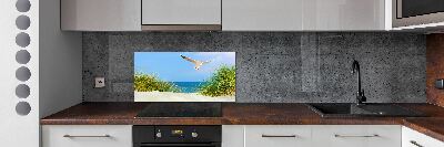 Glass splashback Seagull on the beach