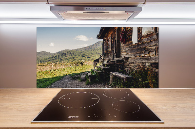 Glass splashback Wooden mountain house