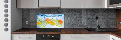 Glass splashback Citruses under water