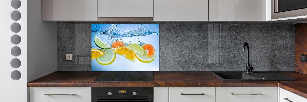 Glass splashback Citruses under water