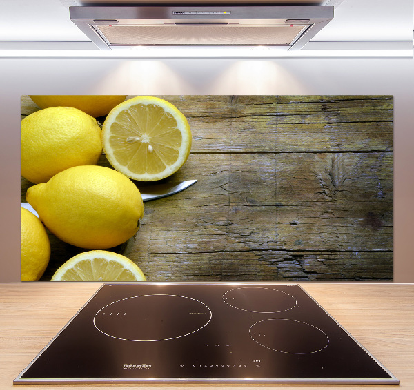 Cooker splashback Lemons on wood