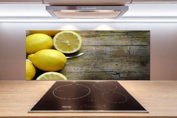 Cooker splashback Lemons on wood