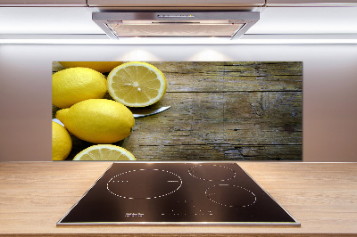 Cooker splashback Lemons on wood