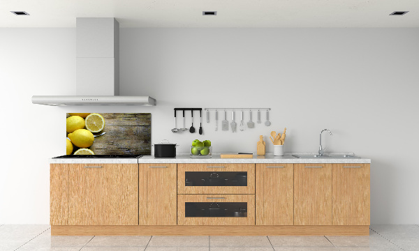 Cooker splashback Lemons on wood