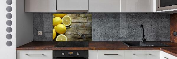 Cooker splashback Lemons on wood