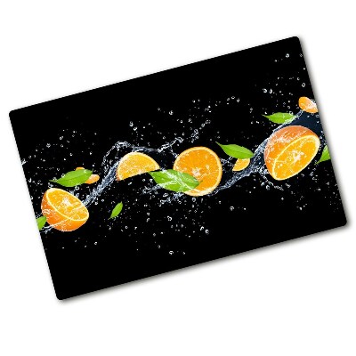 Cutting board Oranges and water