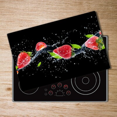 Chopping board glass Strawberries and water