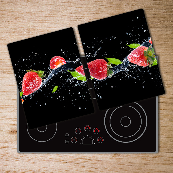 Chopping board glass Strawberries and water