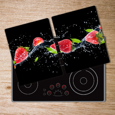 Chopping board glass Strawberries and water