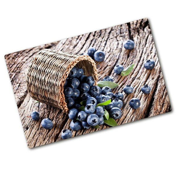 Chopping board glass Berries in the basket