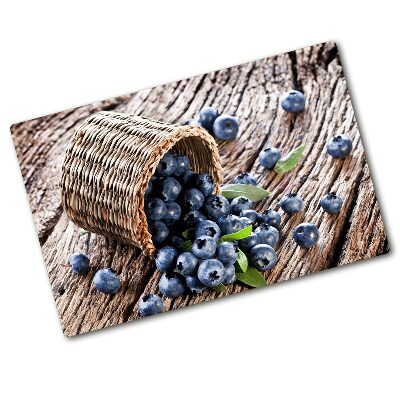 Chopping board glass Berries in the basket