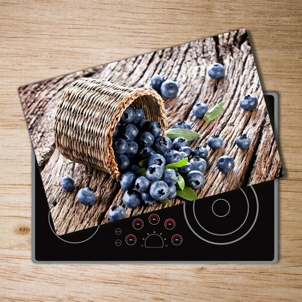 Chopping board glass Berries in the basket