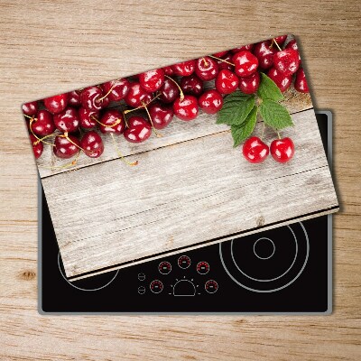 Chopping board glass Cherries on wood