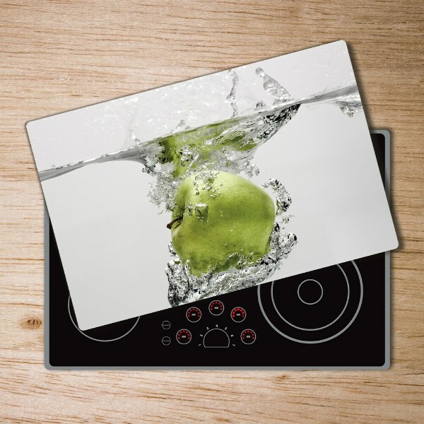 Chopping board glass Apple under water