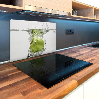 Chopping board glass Apple under water