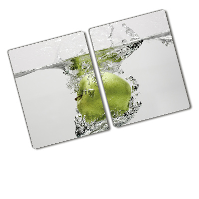 Chopping board glass Apple under water